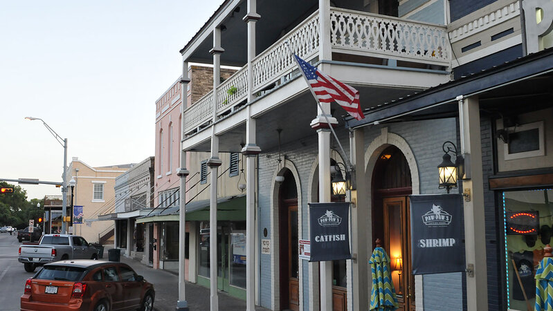 Historic downtown Main Street in Bastrop, Texas with period architecture